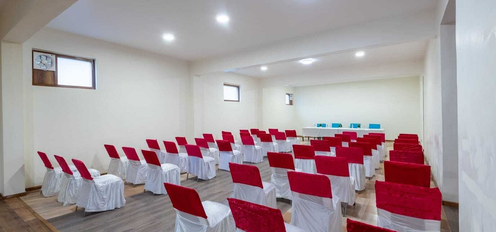 A large conference room with rows of chairs set up for a meeting or presentation  | DLS Serenity Resort and Spa
